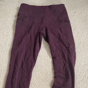 small Burgundy colored athleta leggings